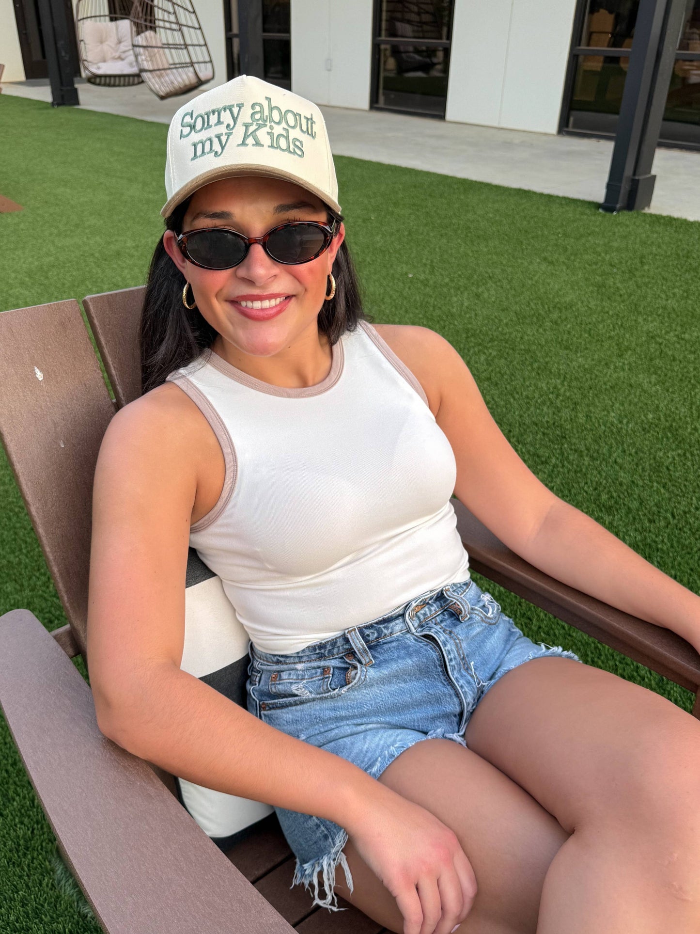 Sorry About My Kids Embroidered Trucker Hat: Black