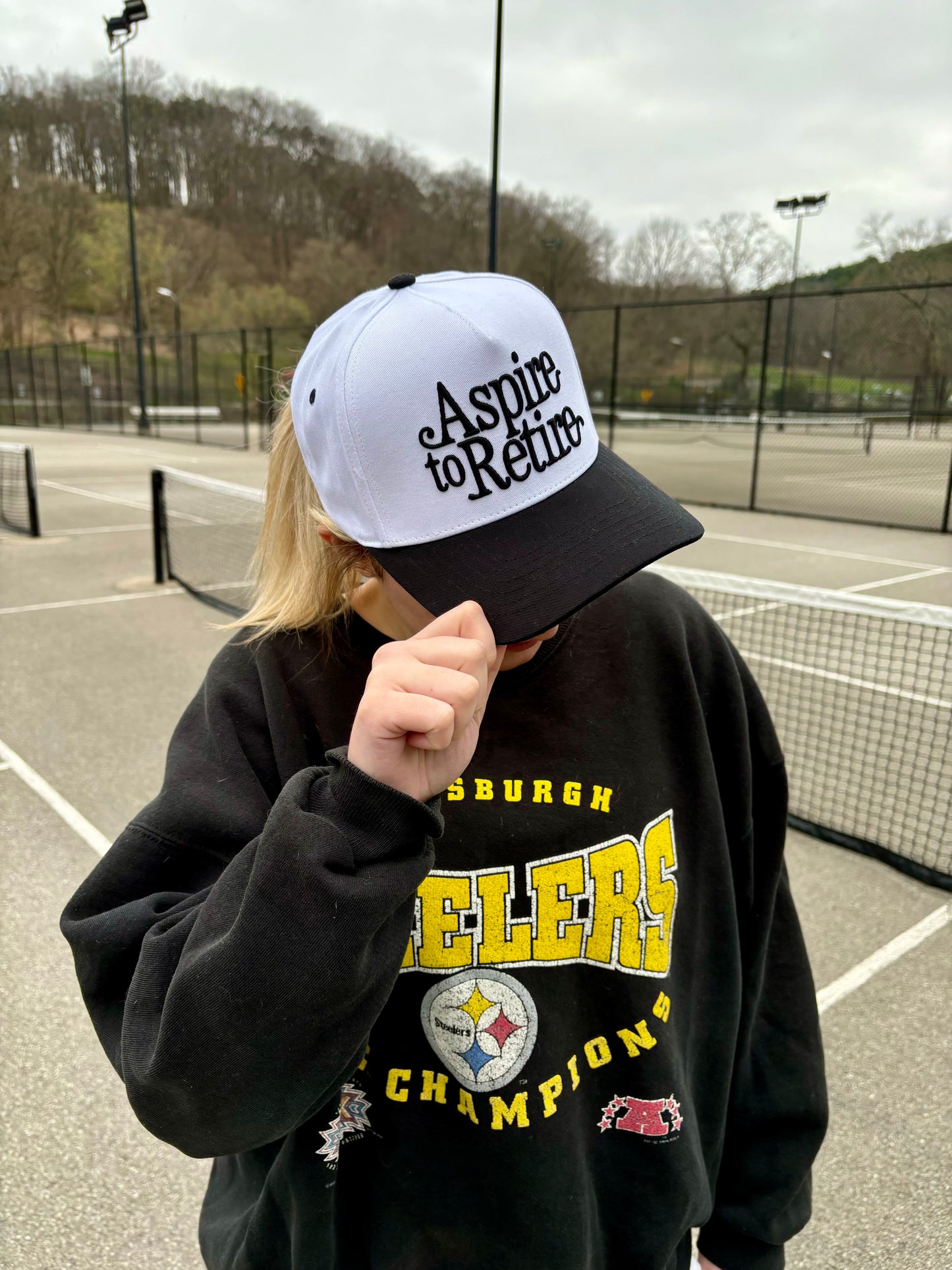 Aspire to Retire Embroidered Trucker Hat